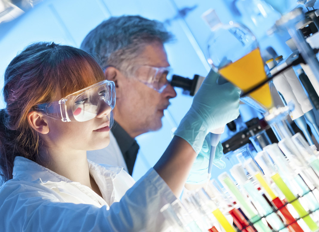 Health care professionals working in laboratory.